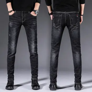 Пролетни нови стрейчевые черни дънки, мъжки тънки директни юношеските мъжки тенденция на ежедневни дълги панталони