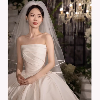 Сатен е чудно красиви сватбени рокли без презрамки, с гънки трапецовидна форма, сватбени рокли принцеса ZW595
